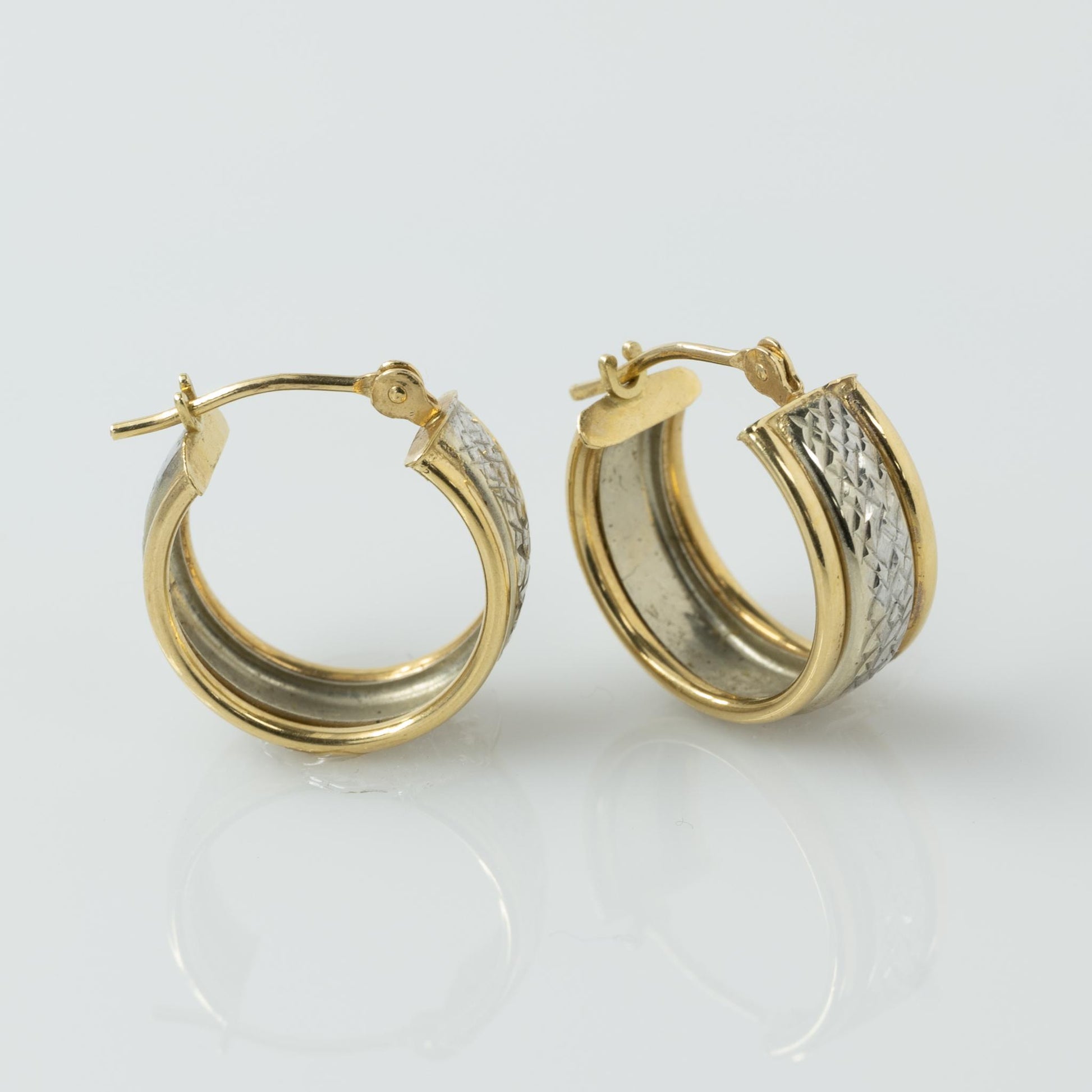 18 Karat Two Tone White & Yellow Gold Textured Small Hoop Earrings