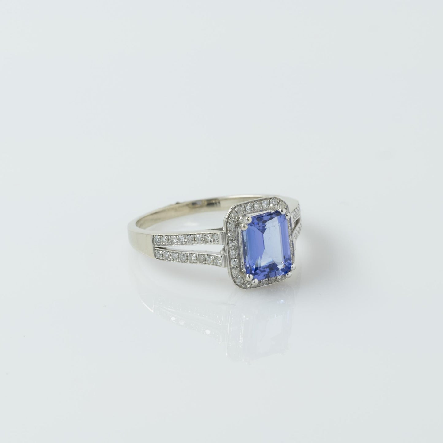 Emerald Cut Tanzanite in Diamond Halo Split Shank 14K White Gold Ring