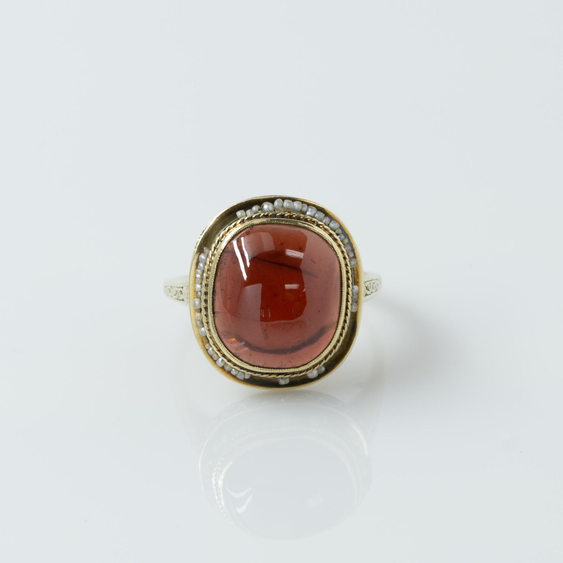 Art Deco Garnet Cabochon and Seed Pearl Yellow Gold Ring