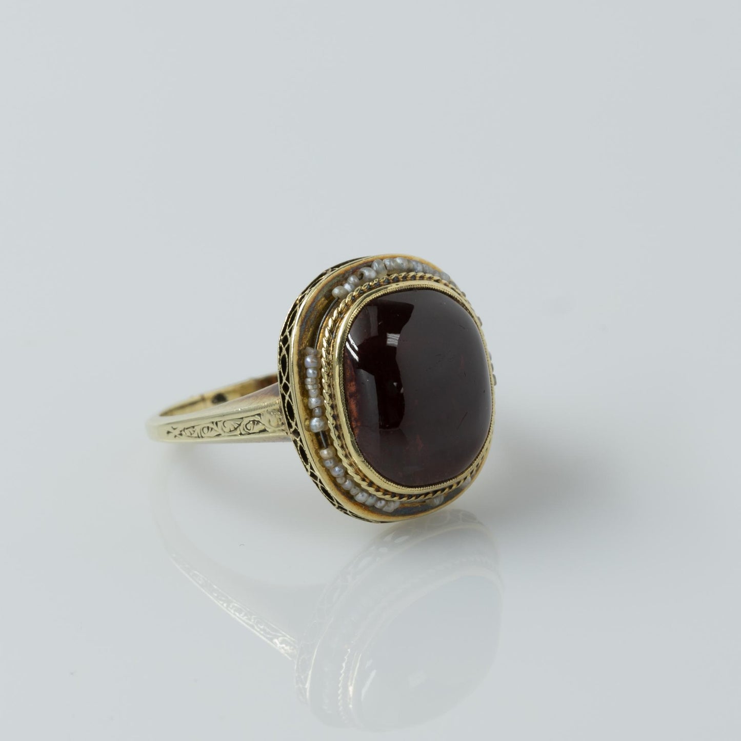 Art Deco Garnet Cabochon and Seed Pearl Yellow Gold Ring