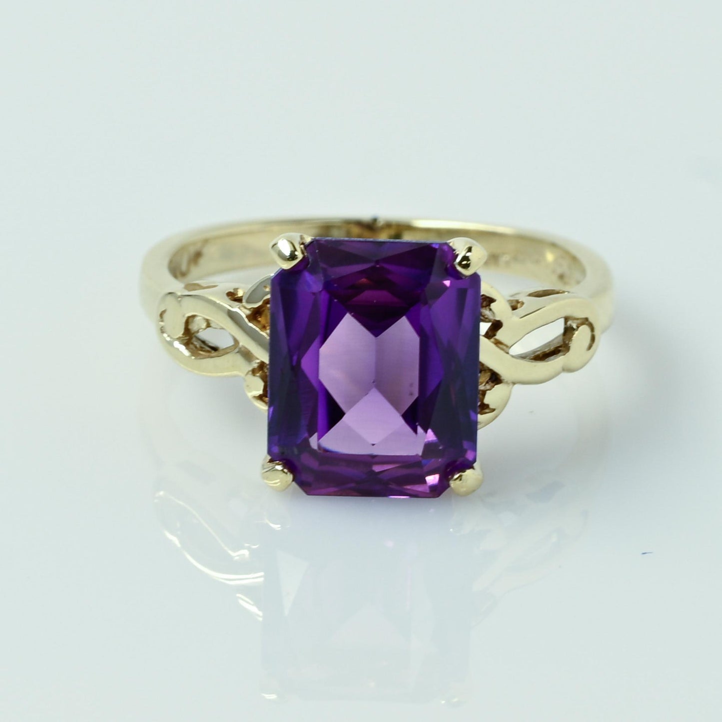 Amethyst Radiant Cut Yellow Gold Solitaire Ring