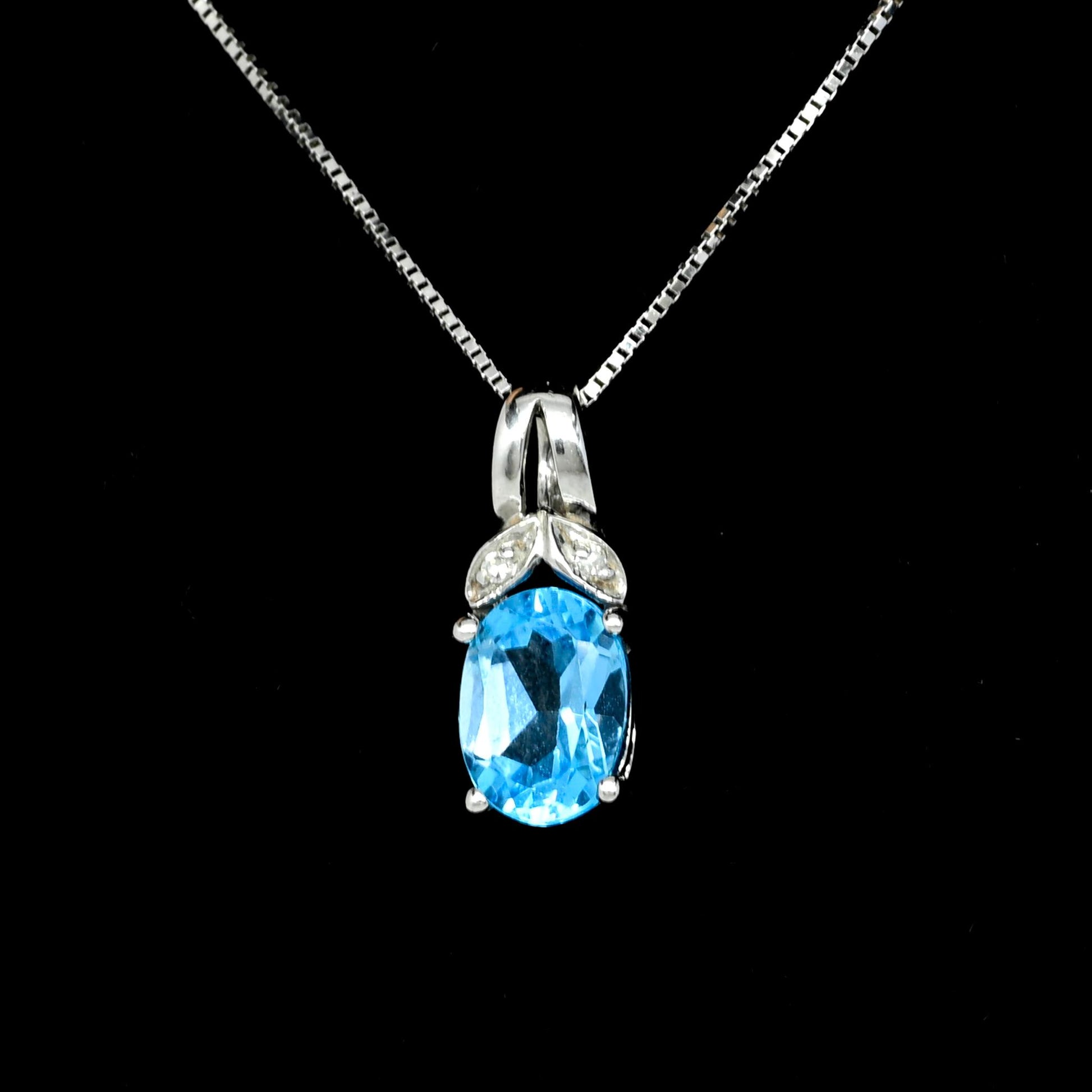 Blue Topaz Oval Diamond Accent White Gold Pendant