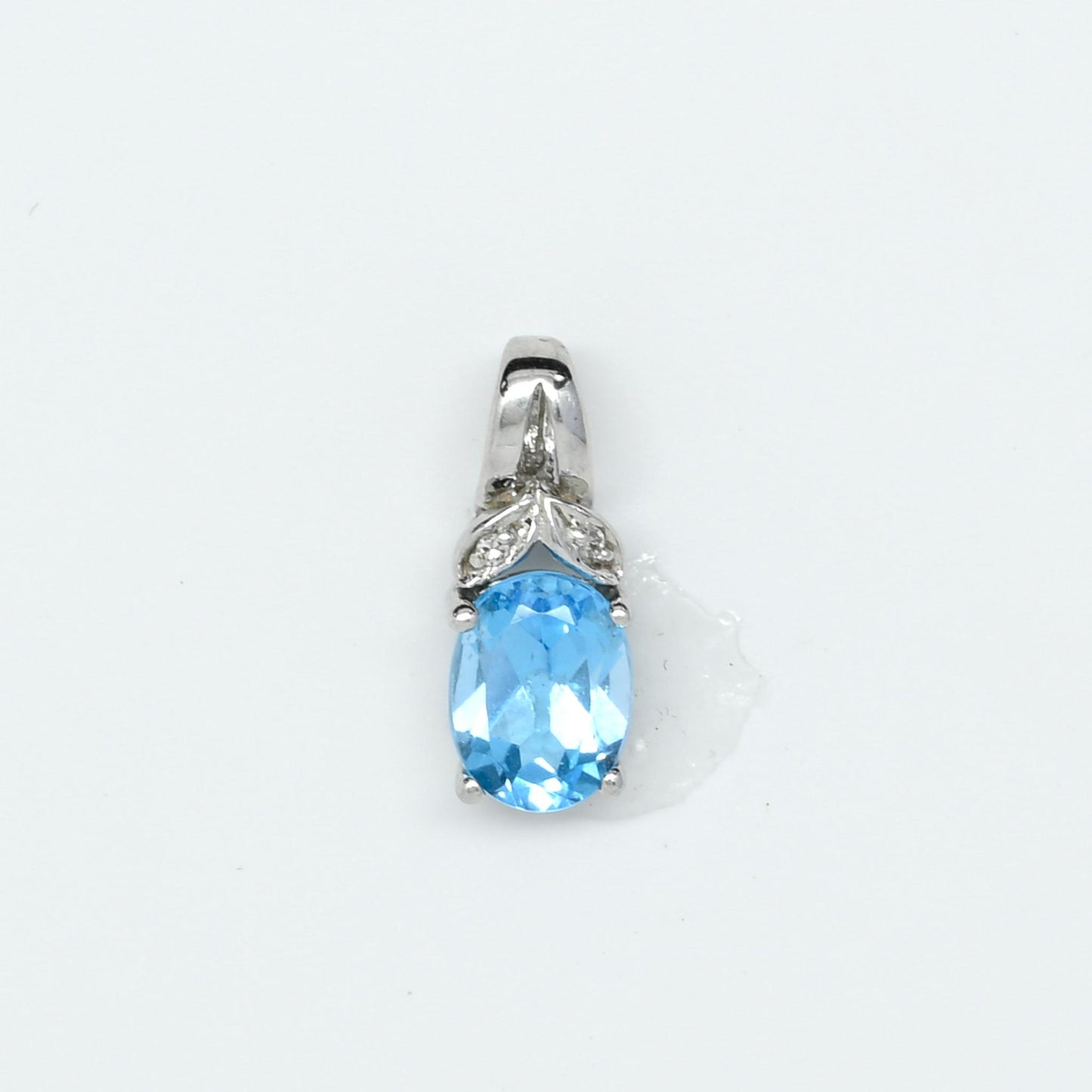 Blue Topaz Oval Diamond Accent White Gold Pendant