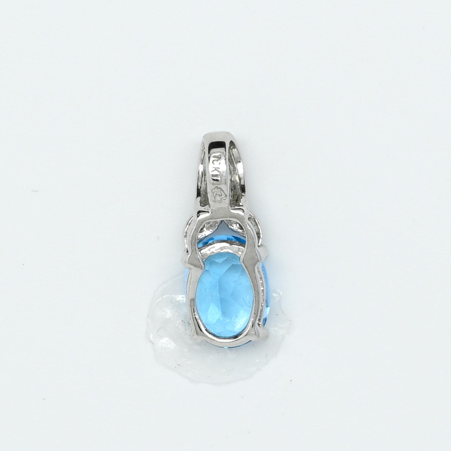 Blue Topaz Oval Diamond Accent White Gold Pendant