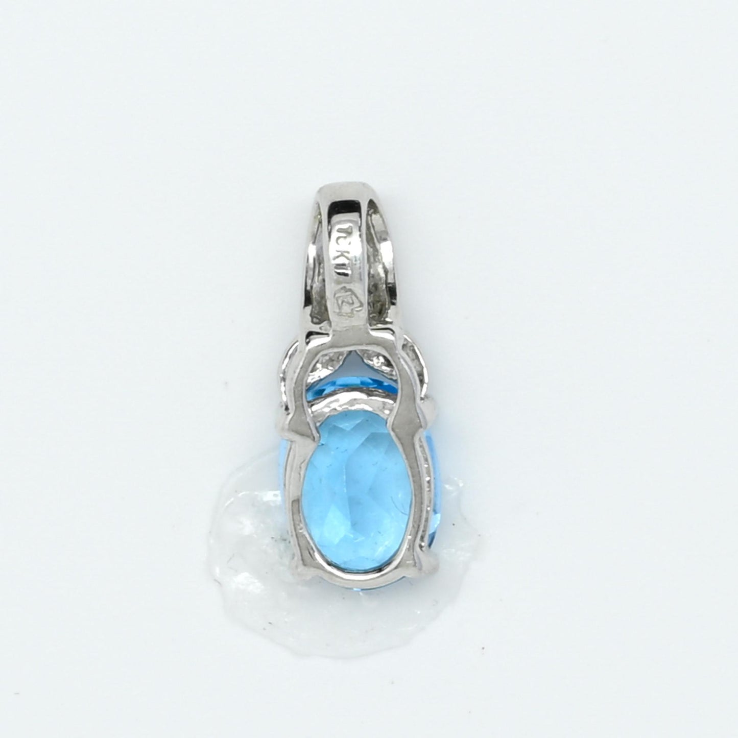 Blue Topaz Oval Diamond Accent White Gold Pendant