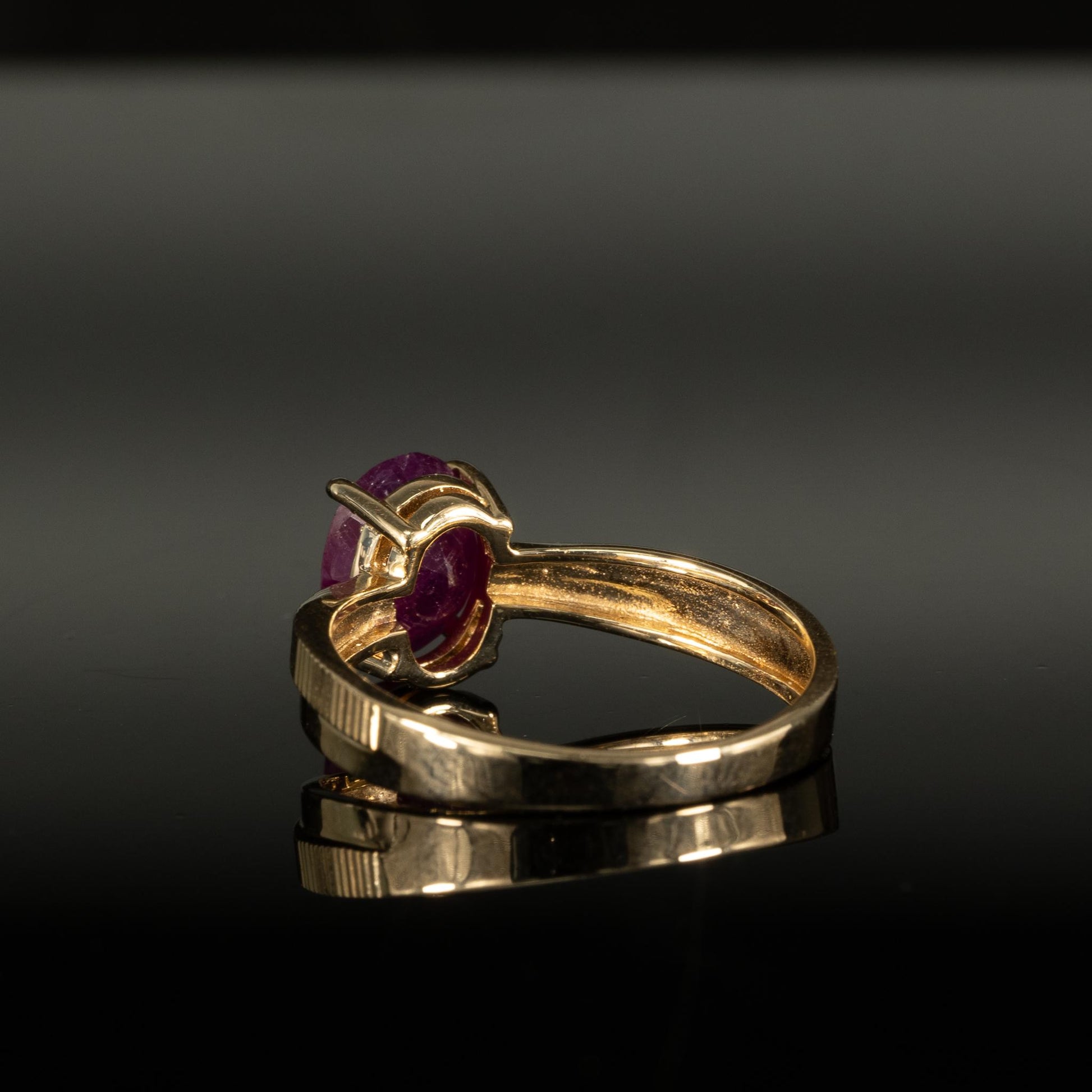 Oval Ruby Solitaire 14k Yellow Gold Textured Cross Over Ring