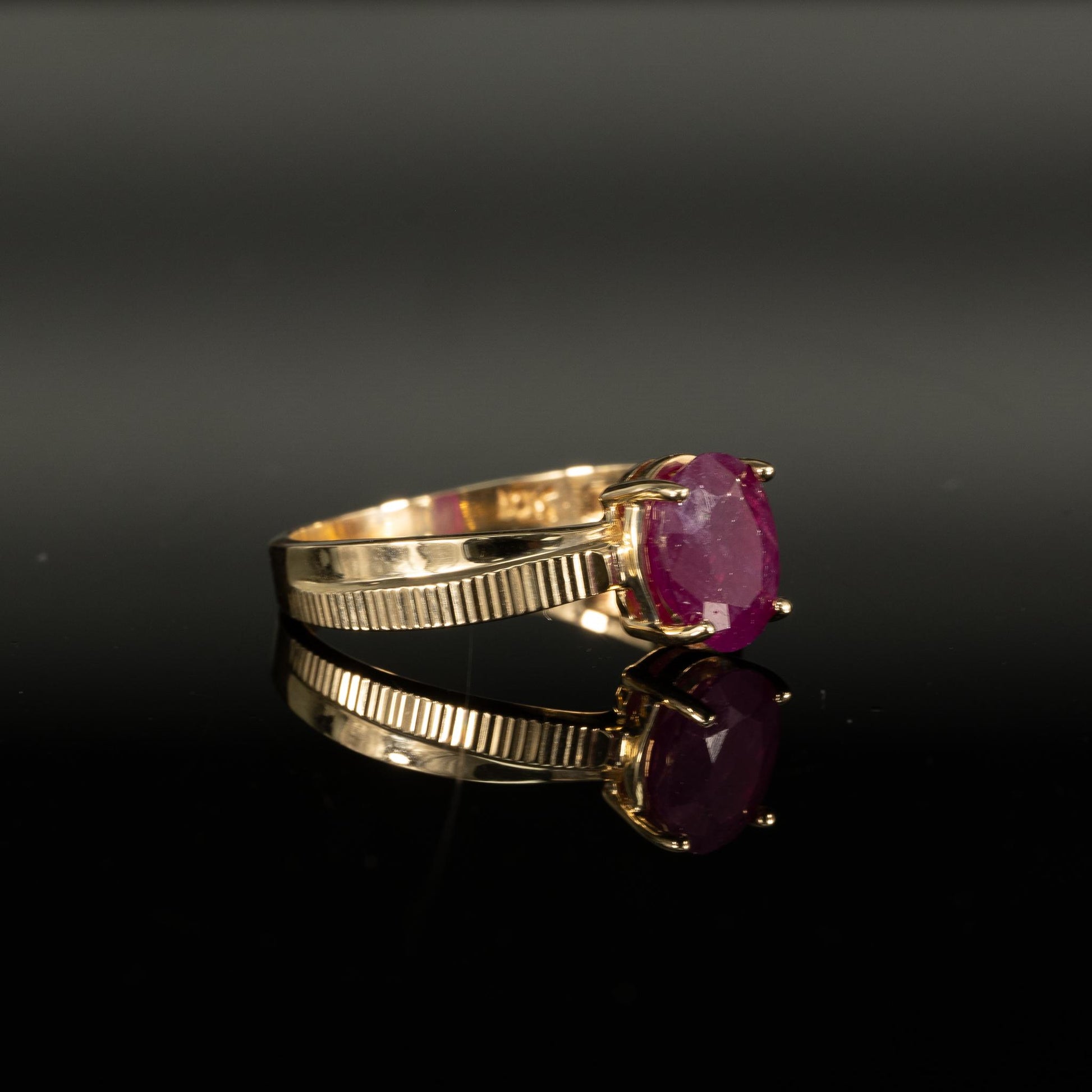 Oval Ruby Solitaire 14k Yellow Gold Textured Cross Over Ring