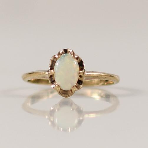 Petite Opal Oval Solitaire Ring in 10k Yellow Gold